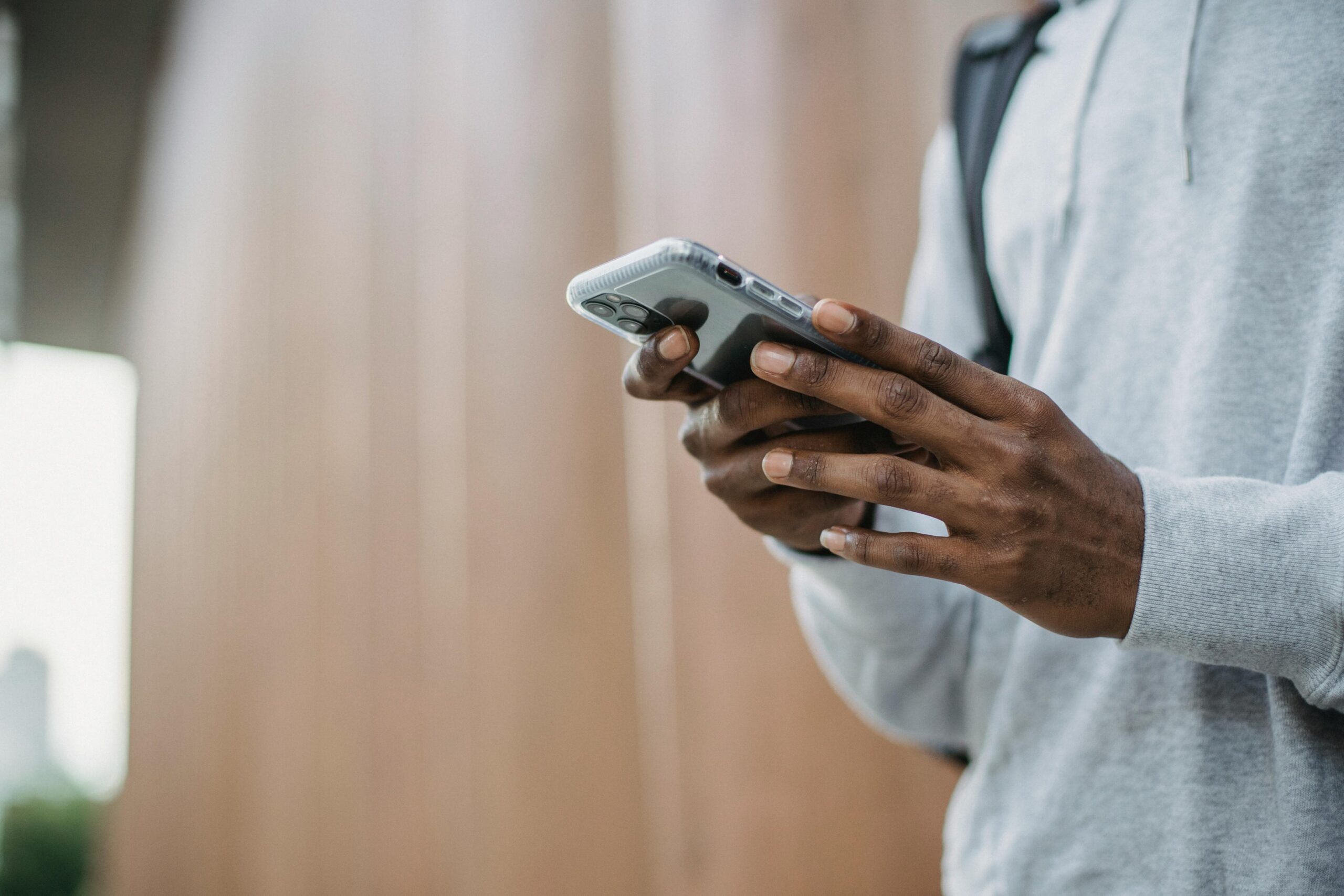 An individual receiving a call from debt collectors who violate TCPA guidelines.
