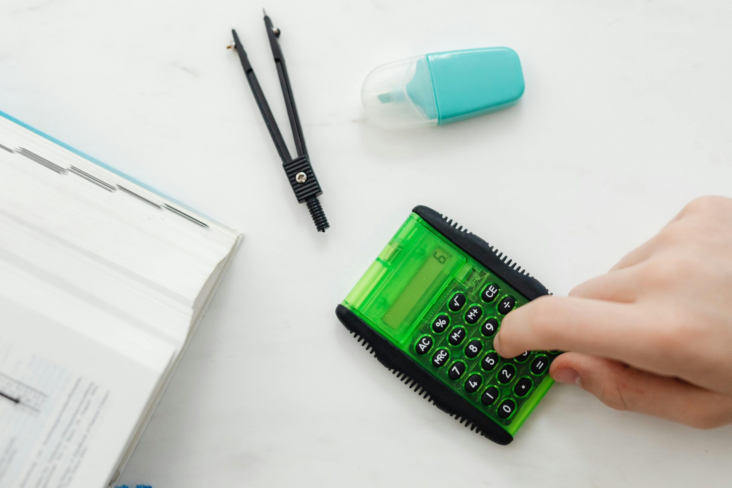 A calculator and stationary.