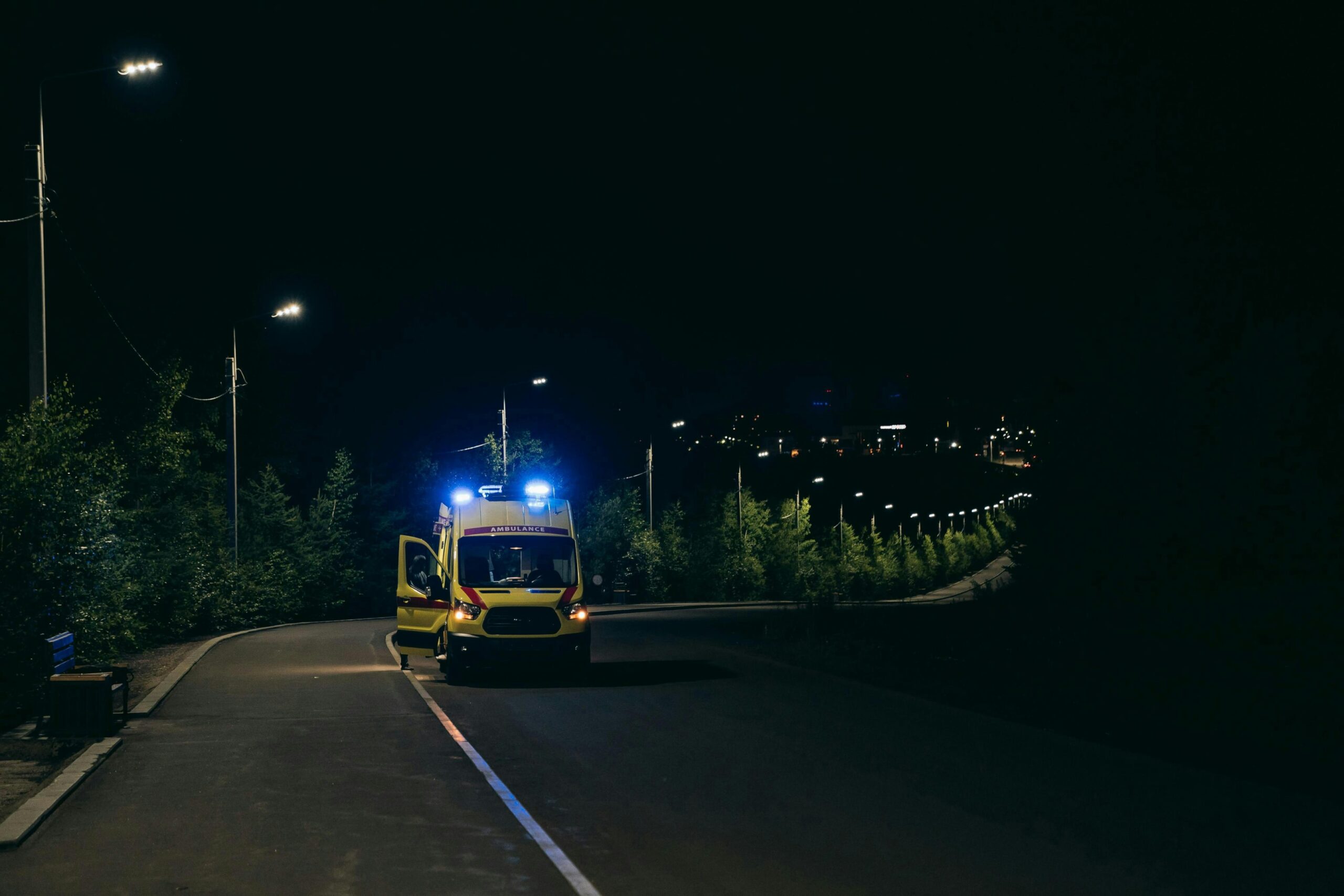 An ambulance in the distance.