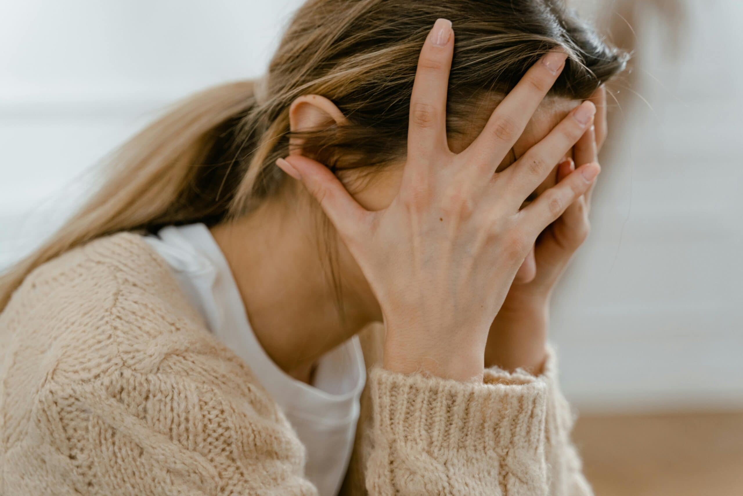 An upset, frustrated woman.