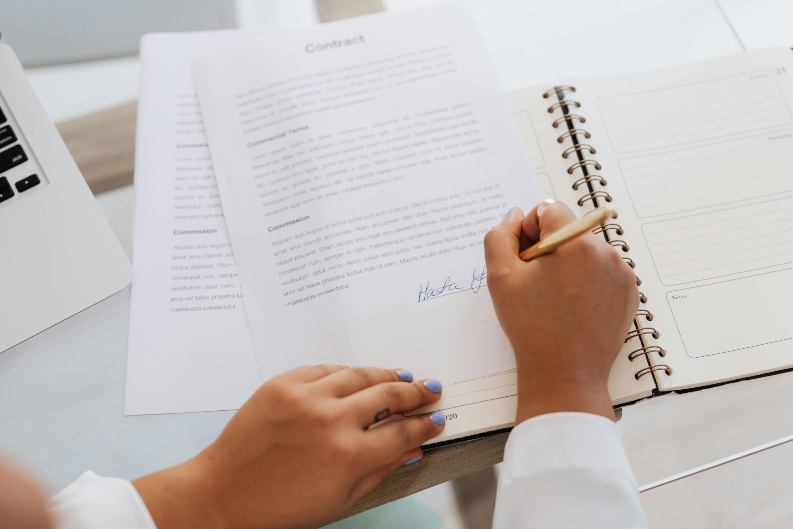 A contract being signed