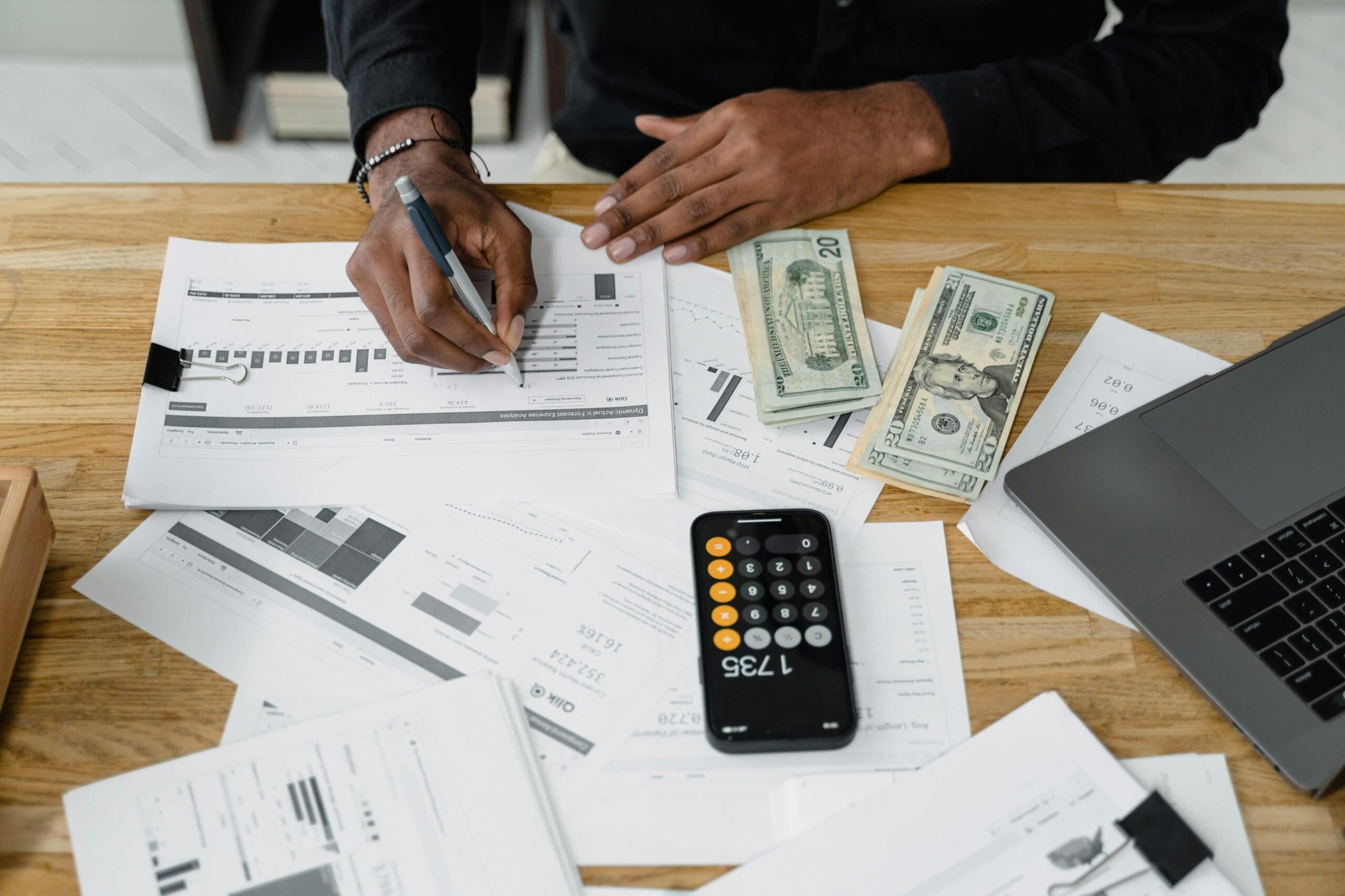 An individual making calculations.