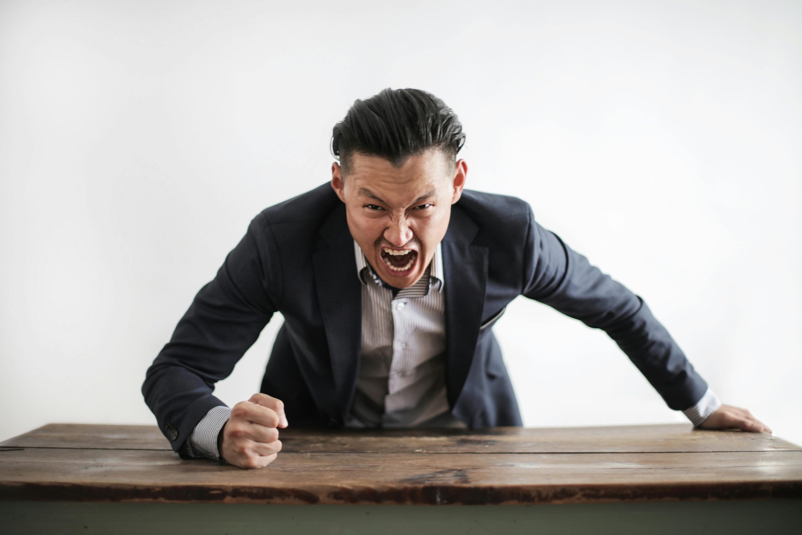 An angry/defensive man.